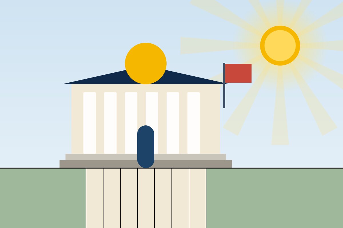 A government building on a sunny day with a flag