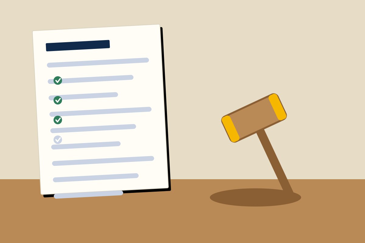 A checklist agenda beside a gavel on a desk